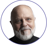 bald man with beard smiling